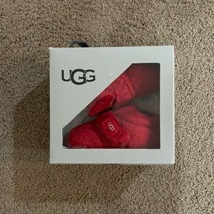 Ugg bixbee baby slippers in red size M 4/5. Brand new in box